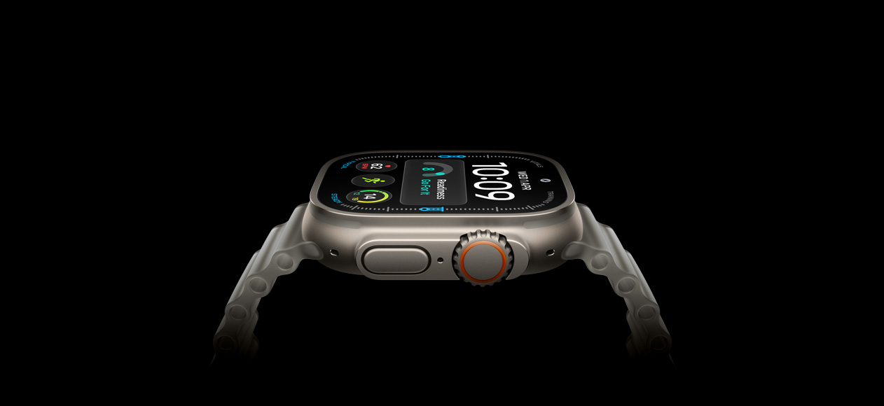 Apple Watch Ultra 4, titanium case, natural color, right exterior, Digital Crown, raised side button, digital watch face, translucent gray Ocean Band