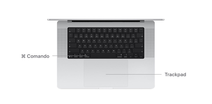 Parte superior de un MacBook Pro de 14 pulgadas con líneas que indican la ubicación de la tecla Comando y el trackpad.