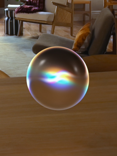 グラデーションがかかったSiri AIアプリのアイコンが空中に浮かんでいる