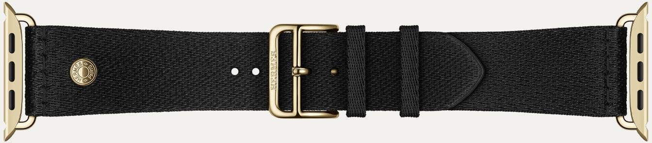 Apple Watch Hermès Series 12 Satin Clou de Selle Noir Armbanddetail, weiches schwarzes satiniertes Gewebe mit golden schimmernden Metallelementen