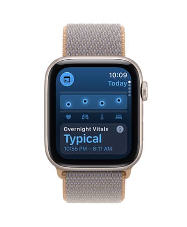 Apple Watch SE 3, aluminum case, starlight color, screen shows health tracking (vitals), right side exterior, Digital Crown dial, Sport Loop band, chambray blue color (light blue-gray)
