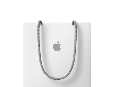 白色 Apple 購物袋，配以灰色穿繩手挽，中央印有 Apple 標誌