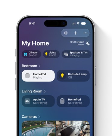 Ein iPhone Display zeigt die Home App, die Ansicht «Mein Zuhause» und Kacheln für Zubehör im Schlafzimmer und Wohnzimmer, einschliesslich Leuchten und HomePod Lautsprechern