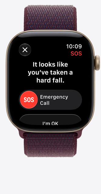 Apple Watch Series 12, screen shows hard fall notification, emergency call option, aluminium case, light gold colour connected to Sport Loop band, burgundy color